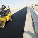 Professional asphalt paving machine working on road construction in Saudi Arabia